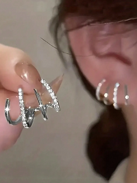 Brincos Quatro Pontas Folheado a Ouro 18K | Elegância e sofisticação em cada detalhe